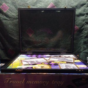 Wooden tray with glass top that opens to display pictures